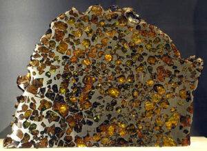   An example of a Pallasite meteorite (from the Esquel fall) on display in the Vale Inco Limited Gallery of Minerals at the Royal Ontario Museum. Credit: Captmondo